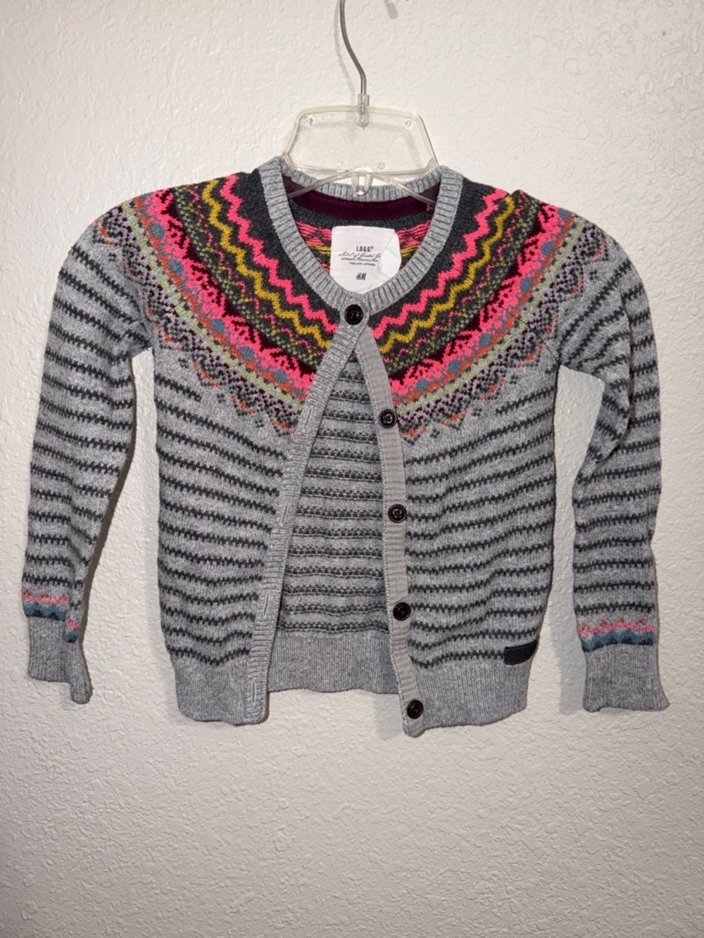 H&M girls' gray cardigan sweater featuring a colorful Fair Isle knit